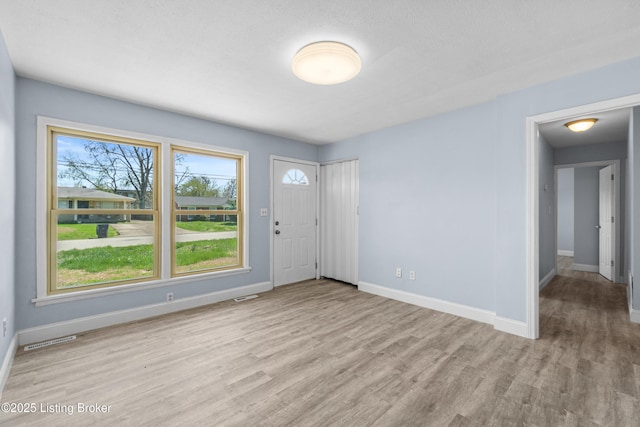 8006 Bramble Ln, Louisville, KY 40258 - entrance foyer with visible vents, baseboards, and wood finished floors