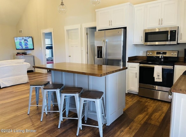 132 Cherry Ln, Leitchfield, KY 42754 - kitchen with white cabinetry, appliances with stainless steel finishes, wood counters, and dark wood-style floors