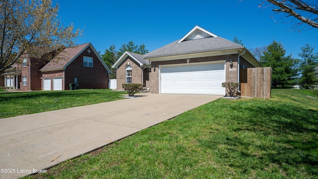 112 Tuscany Ln, Vine Grove, KY 40175 - view of front of house featuring driveway, brick siding, and a garage