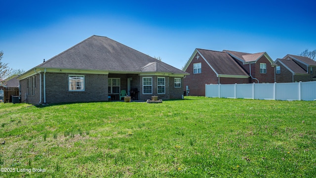 112 Tuscany Ln, Vine Grove, KY 40175 - back of house featuring brick siding and roof with shingles
