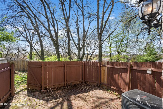view of patio featuring a fenced backyard and cooling unit