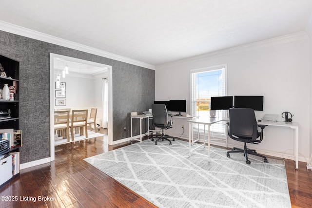 office area with baseboards, hardwood / wood-style flooring, and crown molding