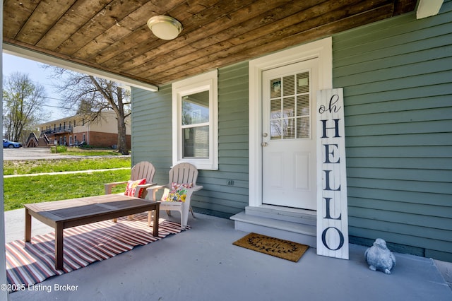 property entrance featuring a porch