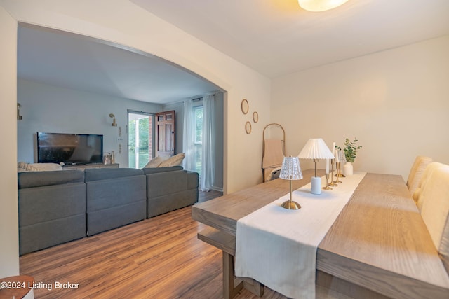 124 E Wellington Ave, Louisville, KY 40214 - dining area with arched walkways and wood finished floors