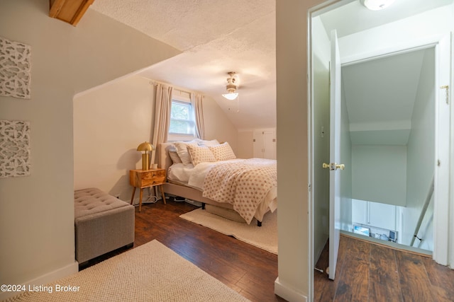 124 E Wellington Ave, Louisville, KY 40214 - bedroom with vaulted ceiling and wood finished floors
