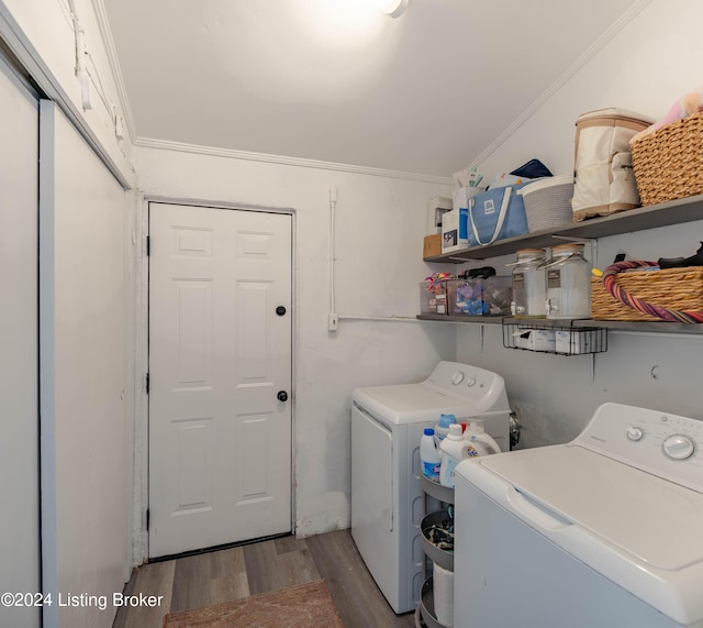 124 E Wellington Ave, Louisville, KY 40214 - laundry room featuring laundry area, wood finished floors, washing machine and clothes dryer, and crown molding