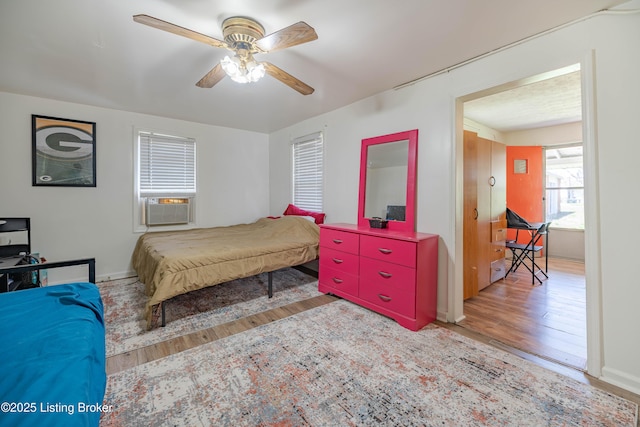 124 E Wellington Ave, Louisville, KY 40214 - bedroom with wood finished floors and a ceiling fan