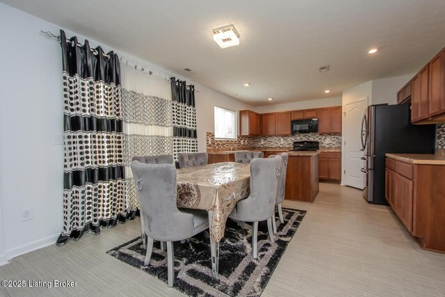 11207 Comfort Ct, Louisville, KY 40229 - dining area featuring recessed lighting and baseboards