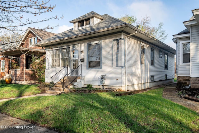 view of front of house featuring a front yard and entry steps