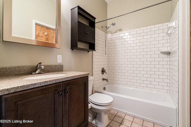 bathroom featuring toilet, shower / bathing tub combination, tile patterned flooring, and vanity