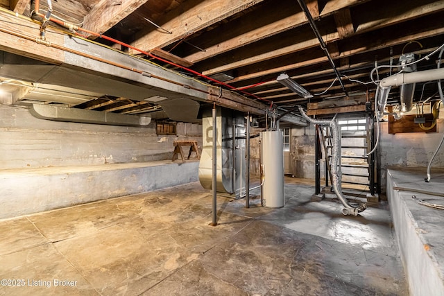unfinished basement with water heater and heating unit