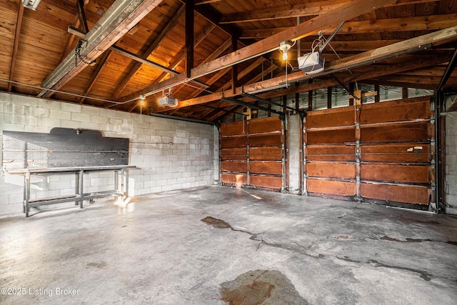 garage featuring a garage door opener
