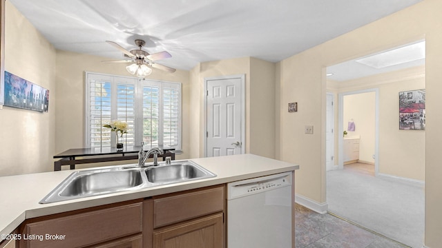 3709 Hurstbourne Ridge Blvd, Louisville, KY 40299 - kitchen with baseboards, light countertops, a ceiling fan, dishwasher, and a sink