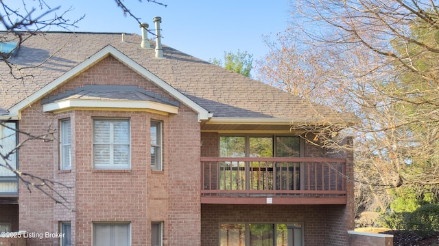 3709 Hurstbourne Ridge Blvd, Louisville, KY 40299 - exterior space featuring roof with shingles and brick siding