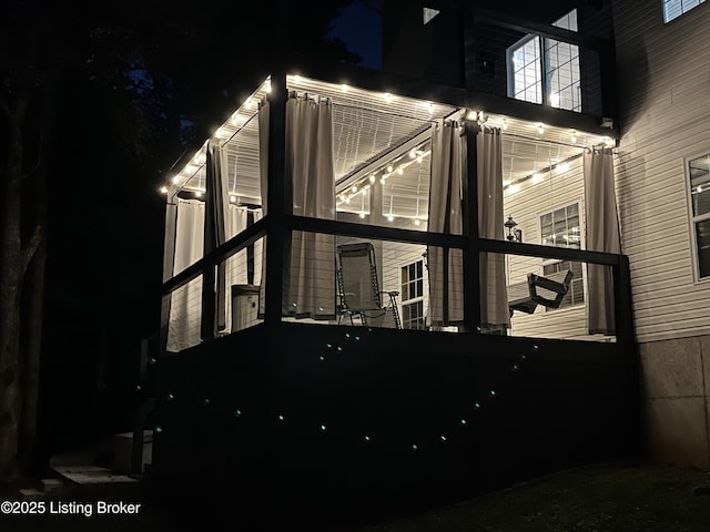 view of property exterior at twilight