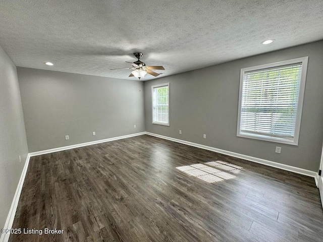 unfurnished room featuring recessed lighting, a textured ceiling, baseboards, dark wood-style flooring, and ceiling fan