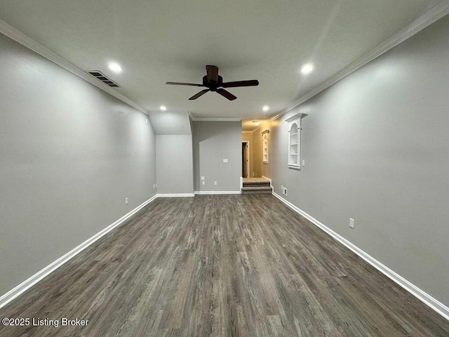 spare room featuring a ceiling fan, crown molding, dark wood finished floors, visible vents, and recessed lighting
