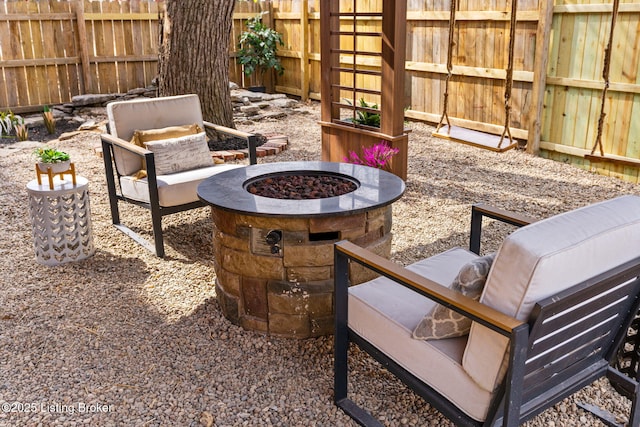 1026 S Brook St, Louisville, KY 40203 - view of patio with an outdoor fire pit and fence