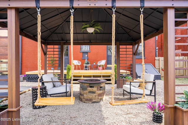 1026 S Brook St, Louisville, KY 40203 - view of patio / terrace featuring a gazebo and a fire pit