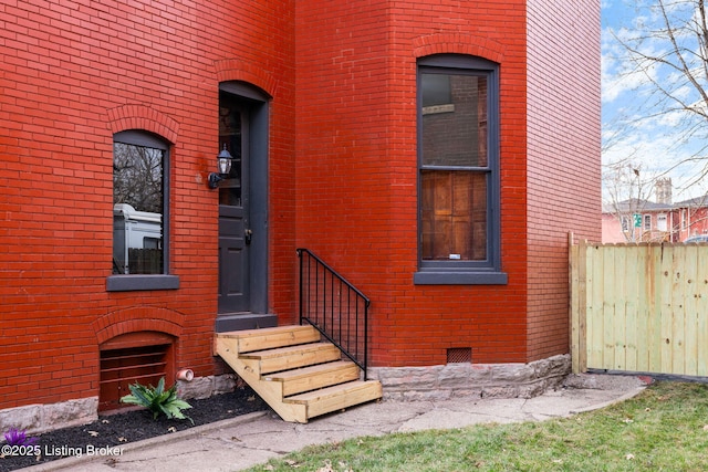 1026 S Brook St, Louisville, KY 40203 - doorway to property with fence and brick siding