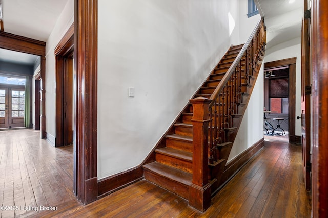 1026 S Brook St, Louisville, KY 40203 - staircase featuring wood-type flooring and baseboards