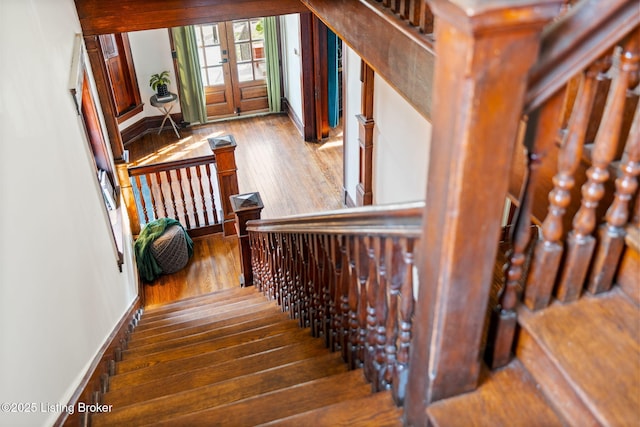 1026 S Brook St, Louisville, KY 40203 - stairs with wood-type flooring and baseboards
