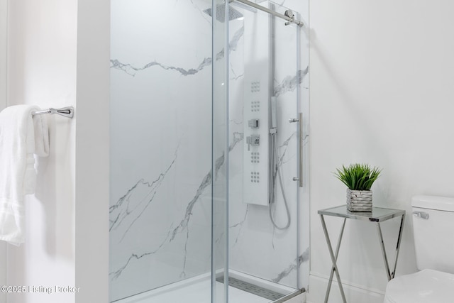 1026 S Brook St, Louisville, KY 40203 - full bath with a marble finish shower and toilet