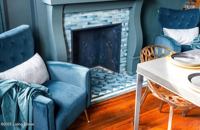 1026 S Brook St, Louisville, KY 40203 - sitting room with a fireplace and wood finished floors