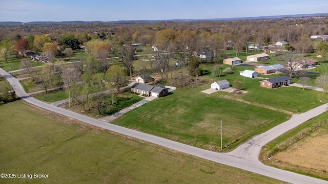 bird's eye view featuring a rural view and a view of trees