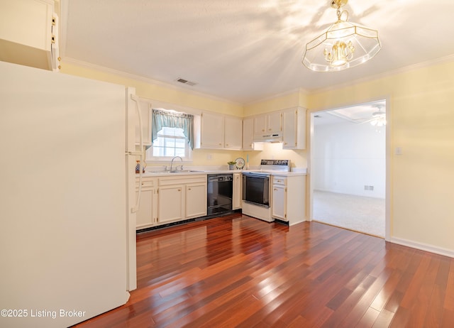 kitchen featuring a sink, visible vents, white appliances, and dark wood-style floors