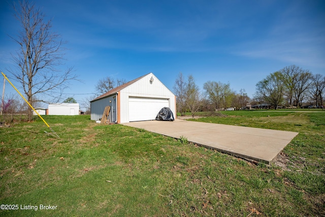 exterior space featuring an outbuilding and a detached garage