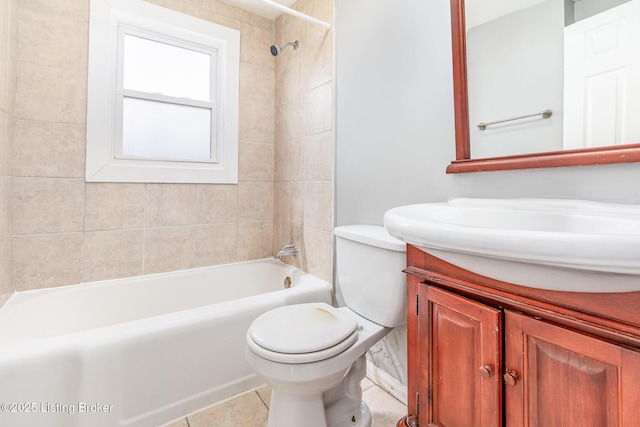 bathroom featuring toilet, vanity, and shower / bathtub combination