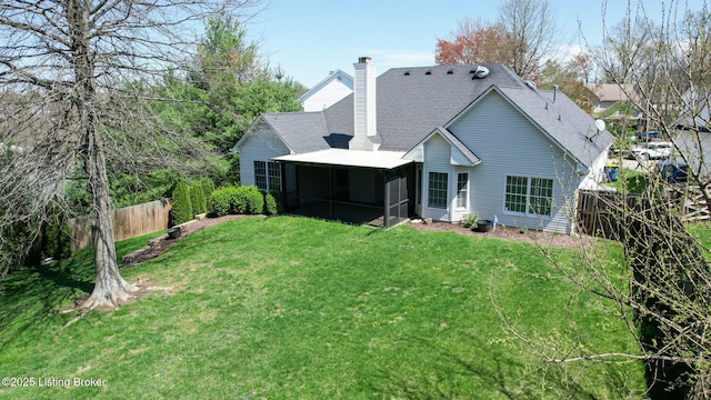 5214 Charlbury Ct, Louisville, KY 40241 - back of house with a sunroom, a yard, fence, and a chimney