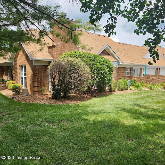 404 Eastgate Village Wynde, Louisville, KY 40223 - view of front of home featuring a front lawn and brick siding