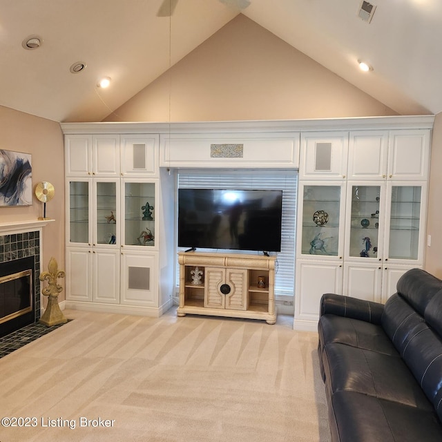 404 Eastgate Village Wynde, Louisville, KY 40223 - living room featuring light colored carpet, a fireplace, lofted ceiling, and visible vents