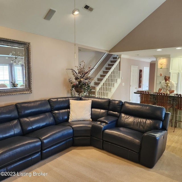 404 Eastgate Village Wynde, Louisville, KY 40223 - living area featuring ornamental molding, visible vents, stairway, and vaulted ceiling