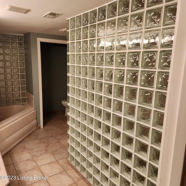 404 Eastgate Village Wynde, Louisville, KY 40223 - full bathroom featuring a garden tub, a walk in shower, visible vents, toilet, and tile patterned floors