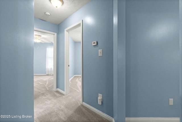 1112 Majestic Woods Dr, La Grange, KY 40031 - corridor with carpet flooring, a textured ceiling, and baseboards