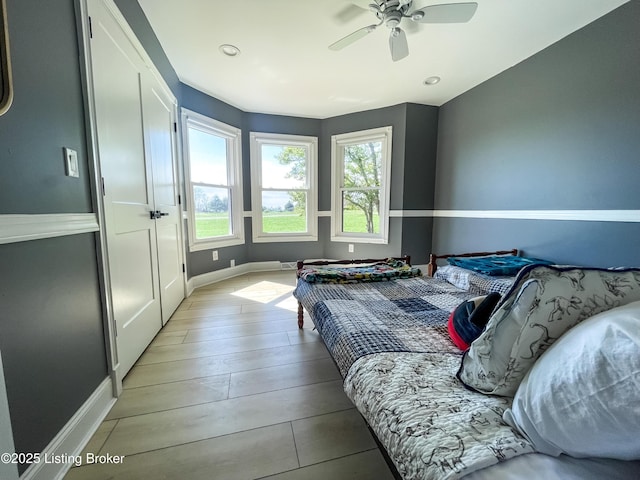 119 Fairway Dr, Hodgenville, KY 42748 - bedroom featuring baseboards, a ceiling fan, multiple windows, and recessed lighting