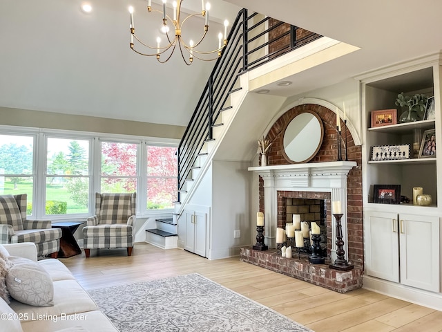 119 Fairway Dr, Hodgenville, KY 42748 - living area with stairway, a towering ceiling, and wood finished floors