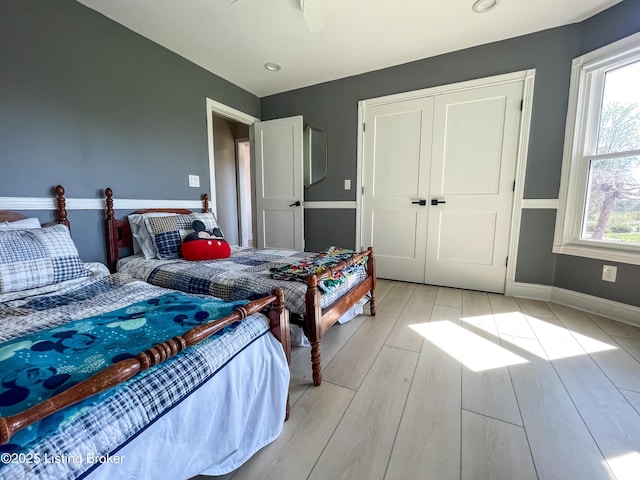 119 Fairway Dr, Hodgenville, KY 42748 - bedroom featuring light wood-style flooring, baseboards, and a closet