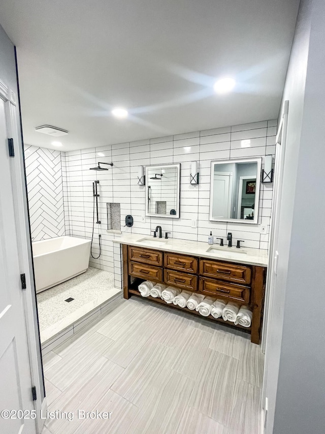 119 Fairway Dr, Hodgenville, KY 42748 - full bath with a freestanding tub, a sink, recessed lighting, and double vanity