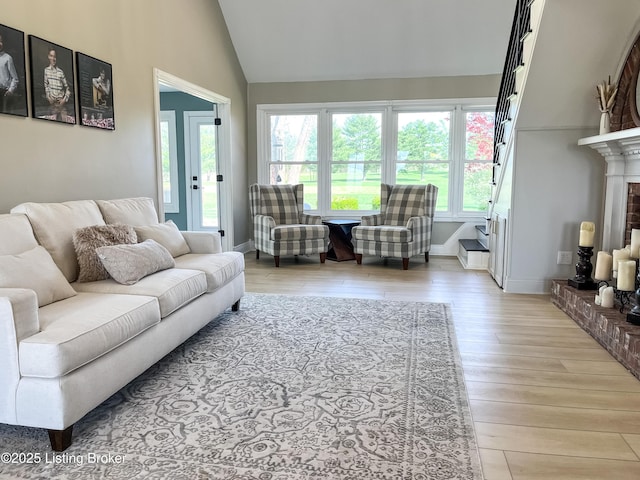 119 Fairway Dr, Hodgenville, KY 42748 - living room featuring hardwood / wood-style floors, plenty of natural light, vaulted ceiling, and baseboards