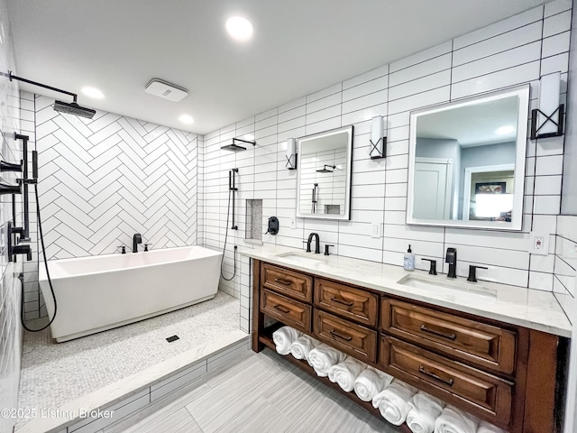 119 Fairway Dr, Hodgenville, KY 42748 - full bath featuring a freestanding bath, double vanity, tile patterned flooring, and a sink