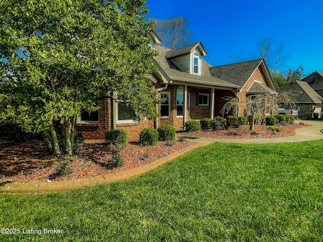 119 Fairway Dr, Hodgenville, KY 42748 - view of front of property with brick siding and a front yard