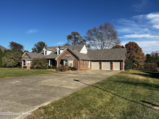 119 Fairway Dr, Hodgenville, KY 42748 - view of front of home featuring concrete driveway, a front lawn, brick siding, and a garage