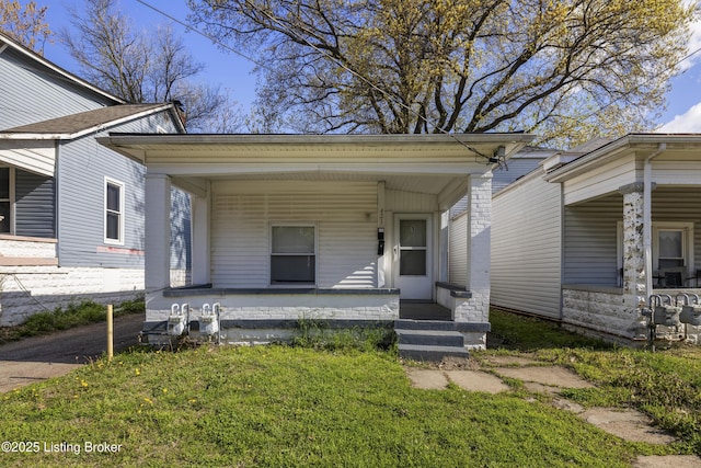view of front of property featuring covered porch