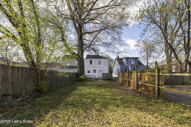 view of yard featuring fence private yard