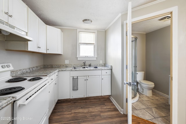 kitchen with white range with electric cooktop, a textured ceiling, a sink, white cabinetry, and under cabinet range hood