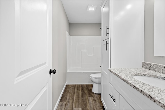 3408 Rhodelia Rd, Payneville, KY 40157 - full bath with vanity, wood finished floors, and bathing tub / shower combination